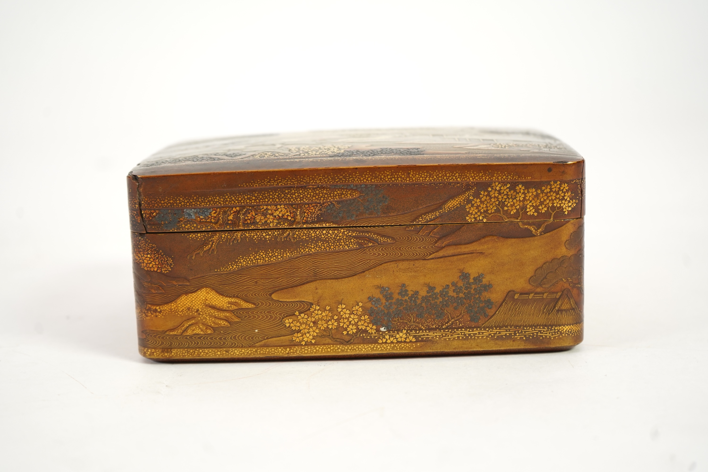 A Japanese gold lacquer ‘landscape’ box, tray and cover, 19th century